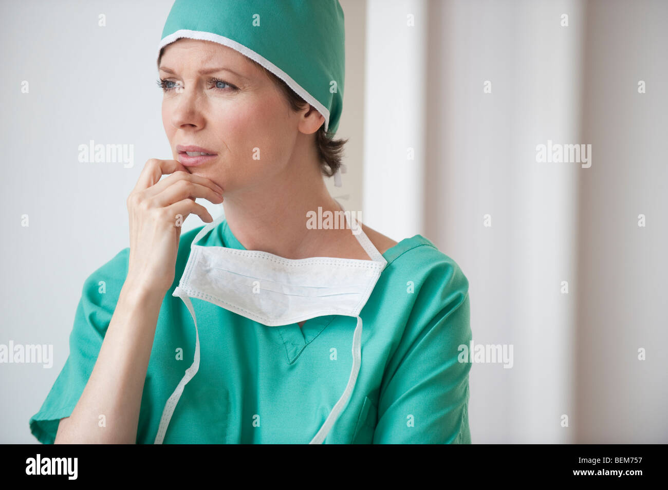 Female doctor looking concerned Stock Photo