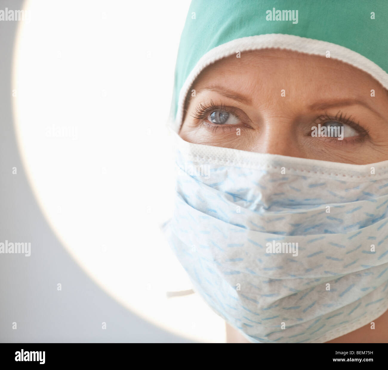 Female doctor with surgical mask Stock Photo