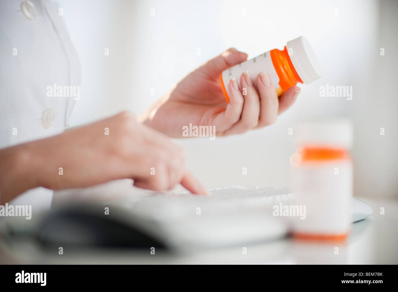 Woman reading medical label Stock Photo