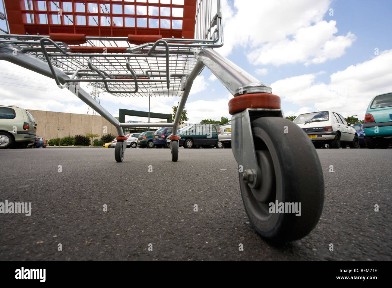 Shopping cart in parking lot, surface level view Stock Photo Alamy