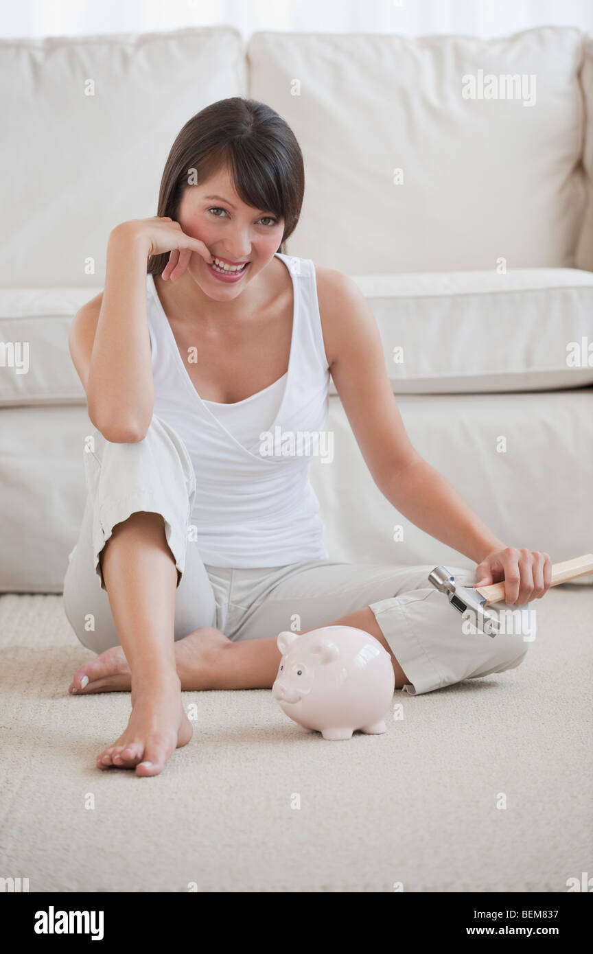 Woman with piggy bank Stock Photo - Alamy
