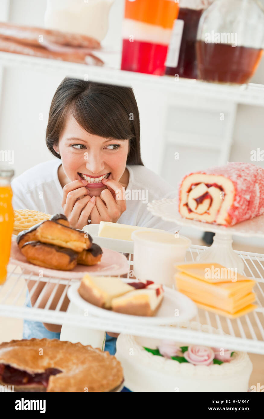 Woman looking at sweets Stock Photo