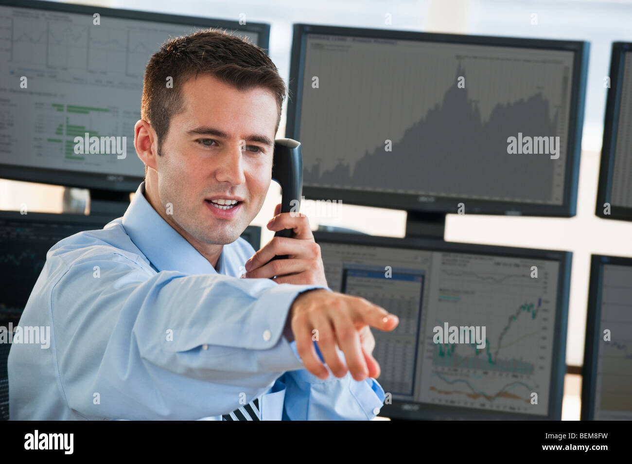 Trader at on phone Stock Photo