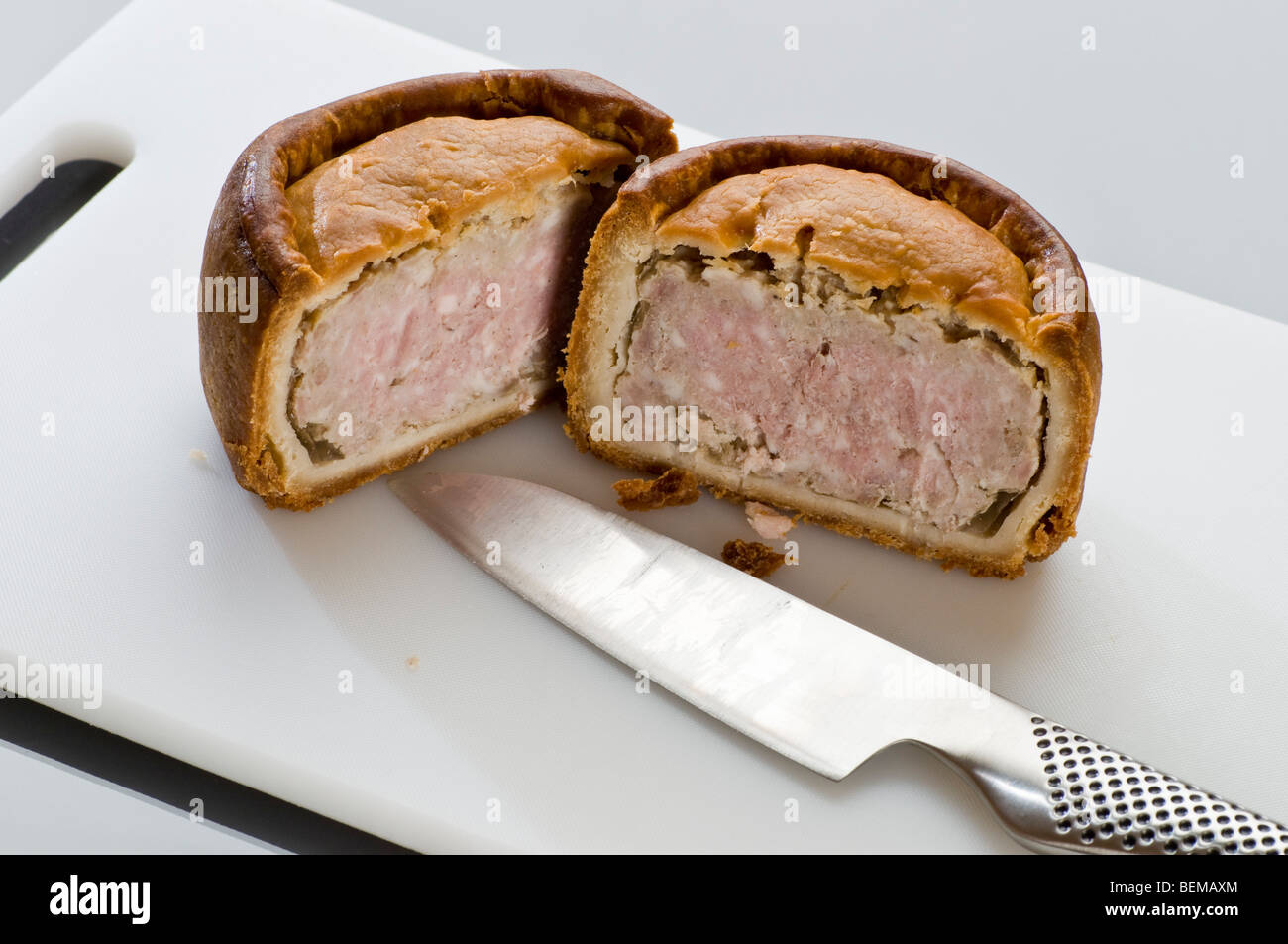 Melton Mowbray pork pie cut in half Stock Photo Alamy
