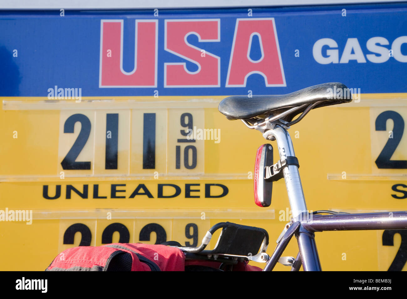 A close up of an USA Gasoline price list and bicycle on March 24, 2009. Los Altos, California, USA Stock Photo