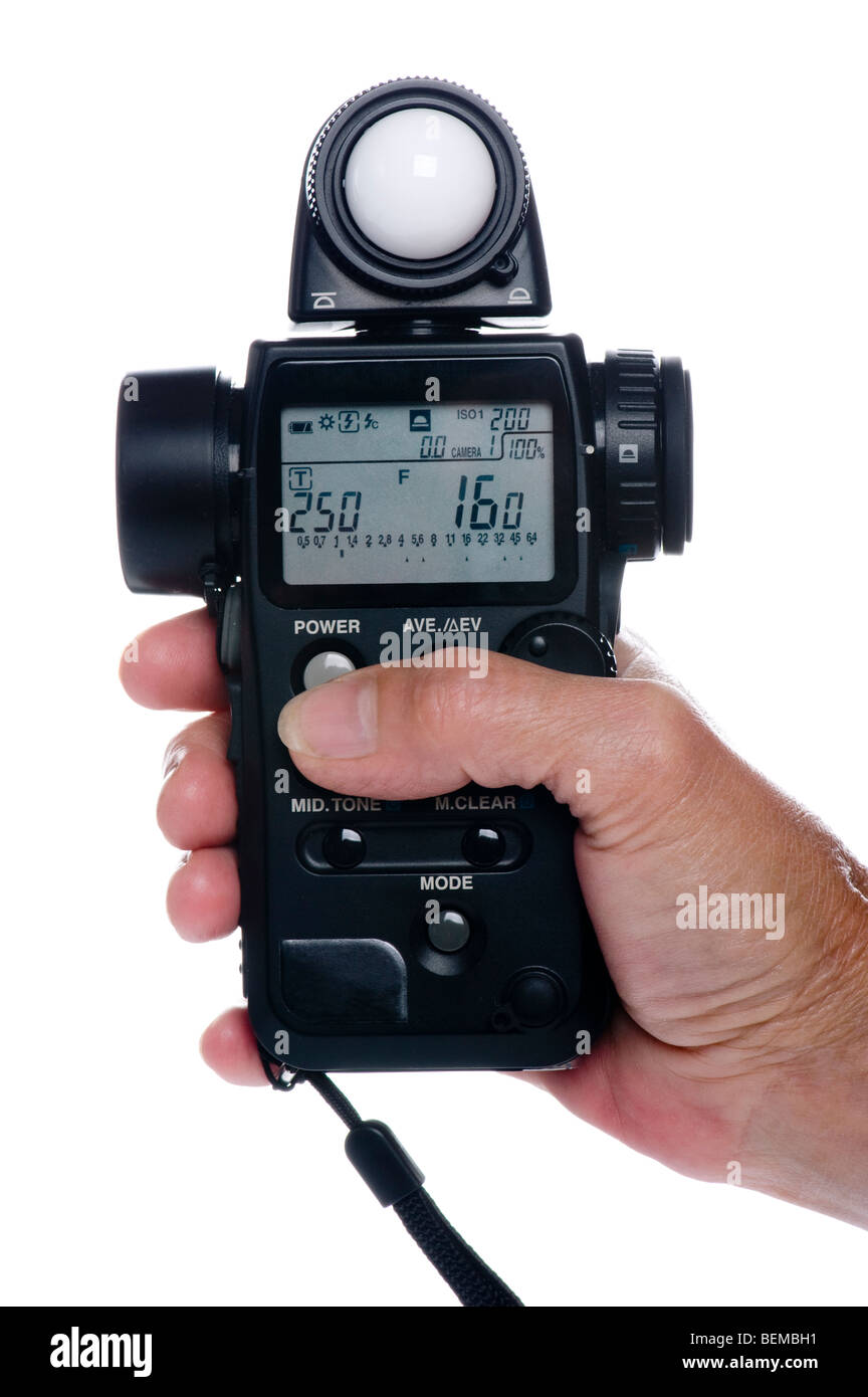 object on white flash meter on hand Stock Photo Alamy