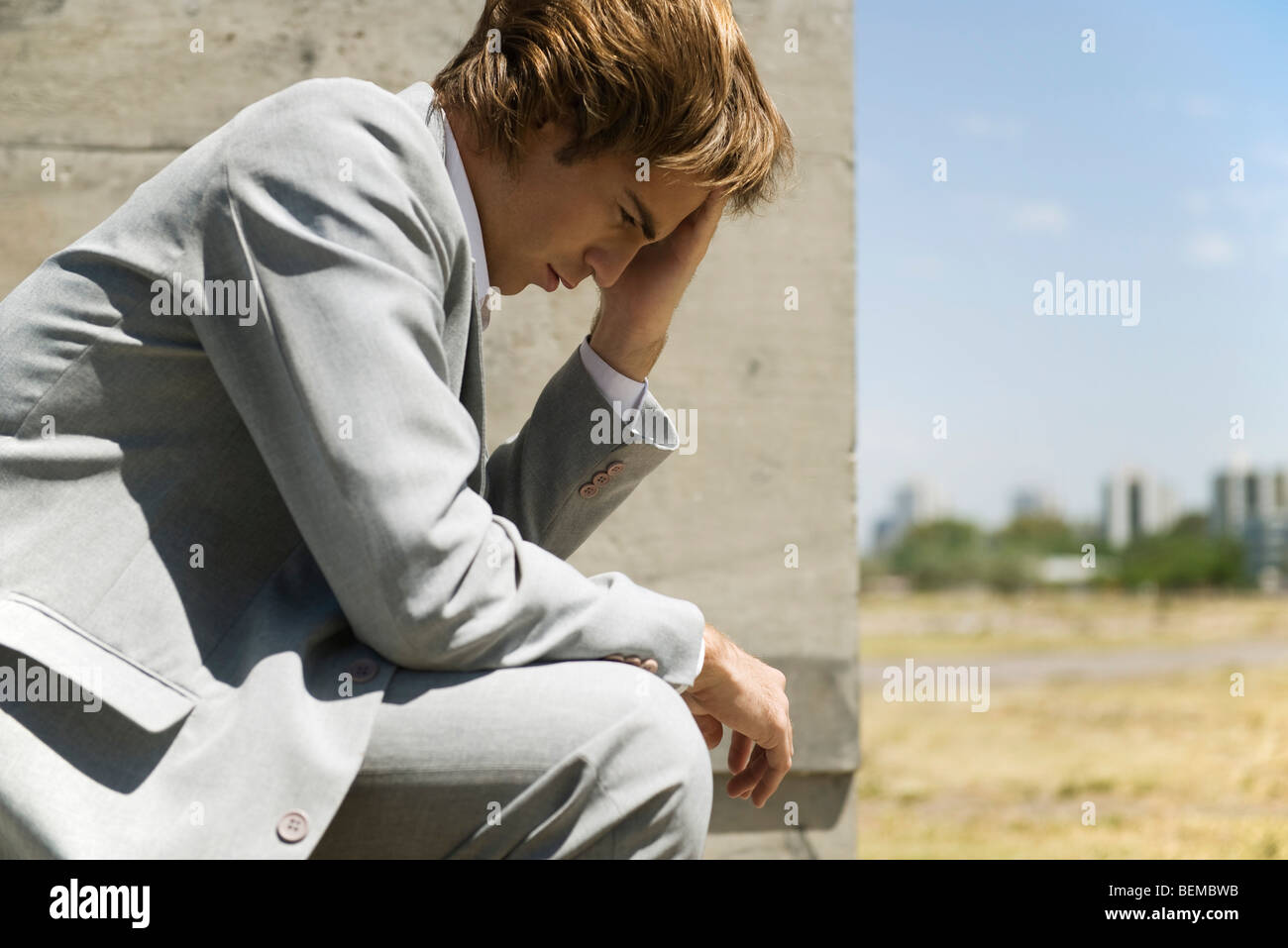 Sits contemplatively on hi-res stock photography and images - Alamy