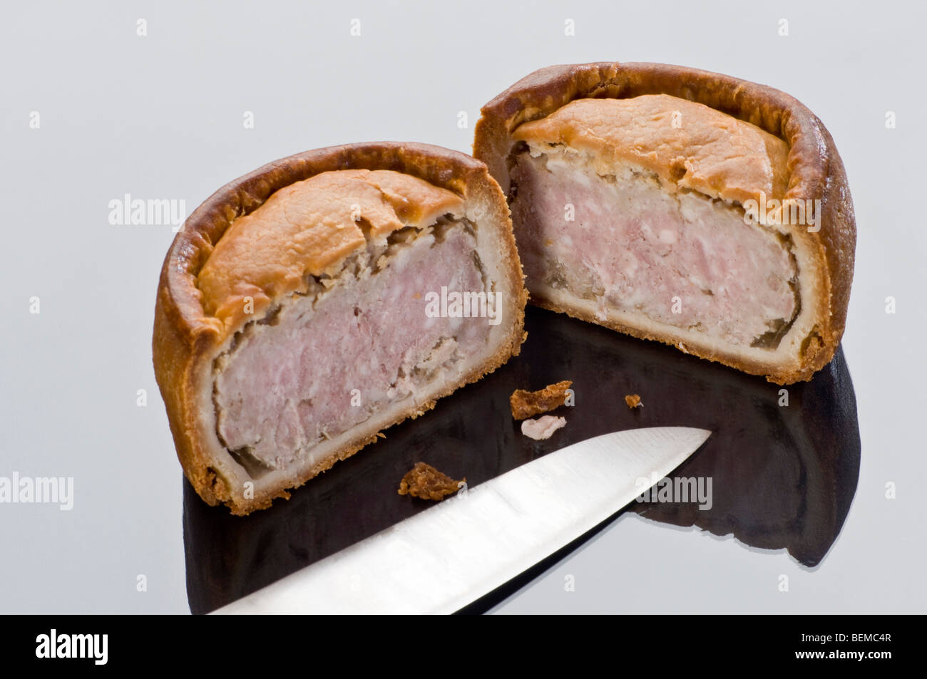 Melton Mowbray pork pie cut in half Stock Photo Alamy