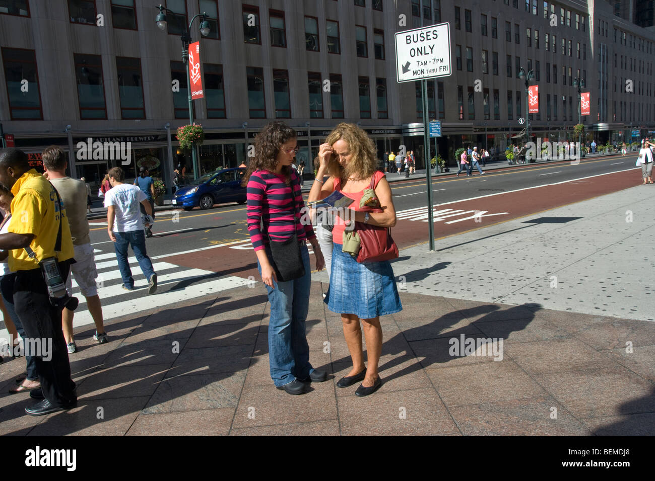 Tourist with map asking directions in New York City. Stock Photo
