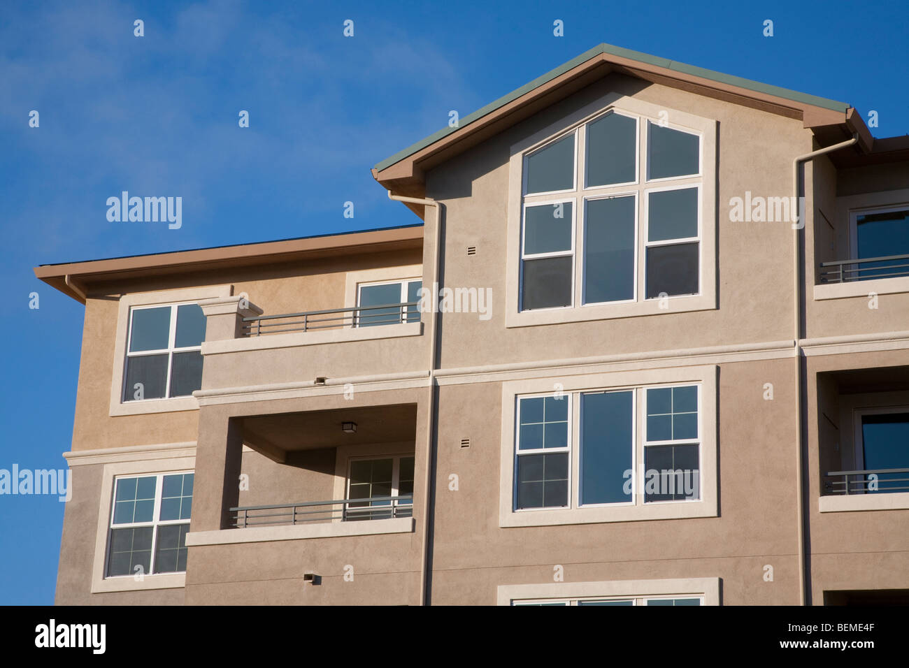 A close up of apartments in a mixed use building. Park Broadway on El