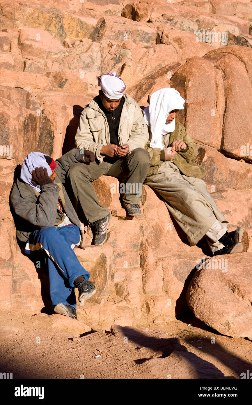 Egyptian bedouin guides early morning on trek from Mount Sinai, Egypt, Middle East Stock Photo