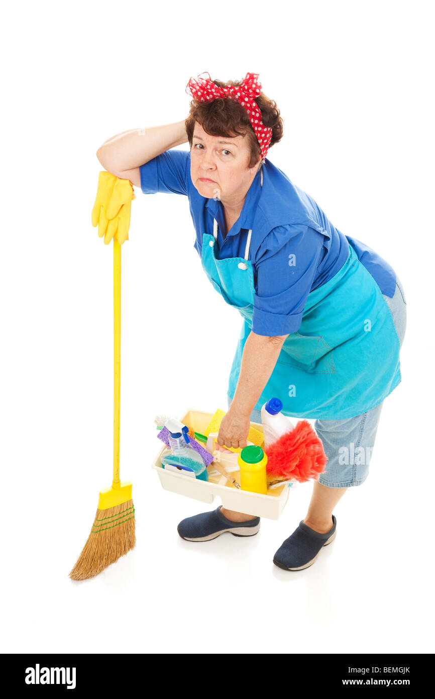 Cleaning lady unhappy and exhausted. Full body isolated on white. Stock Photo