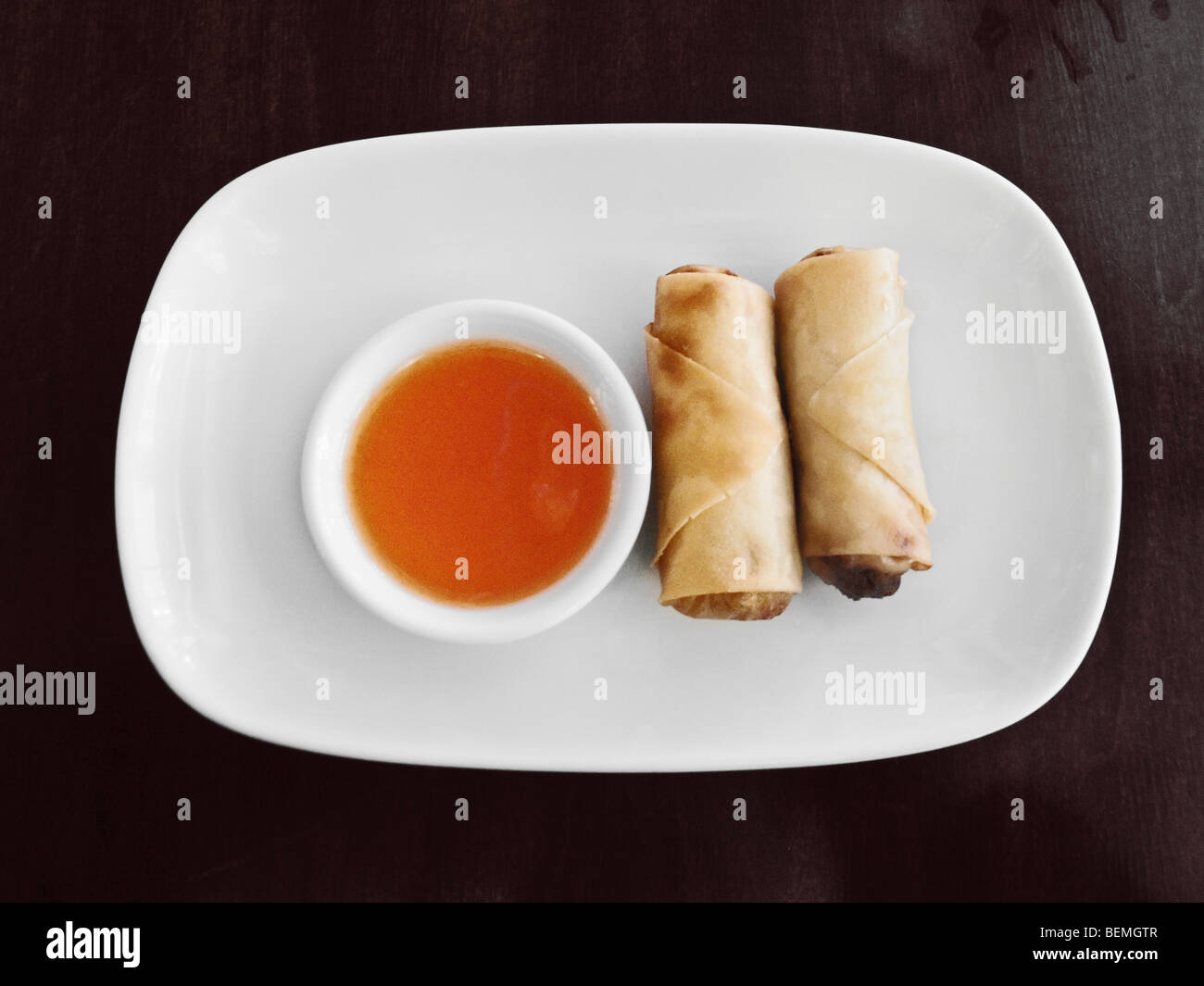 Two Spring Rolls With Side Dip Stock Photo
