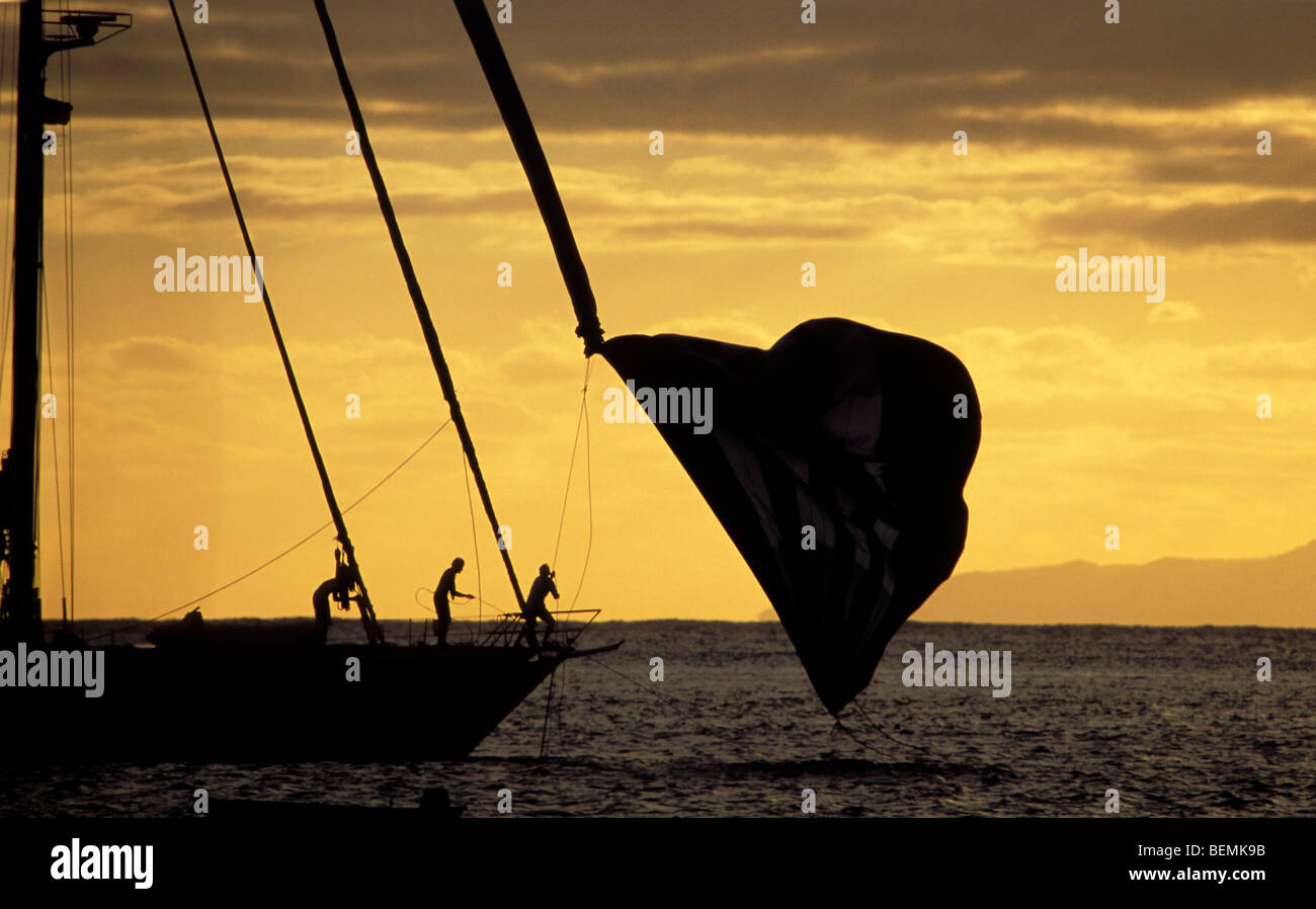 Sailing ships in sunset Huahine French Polynesia Stock Photo - Alamy