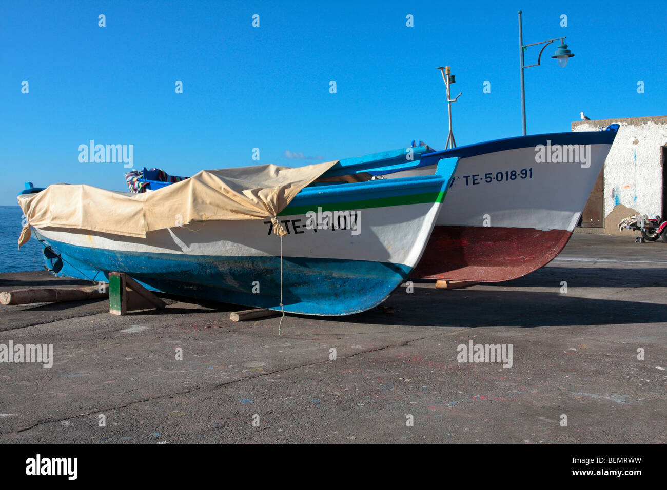 Fishing boats on the quayside at Puerto de Santiago Tenerife Canary Islands Spain Stock Photo