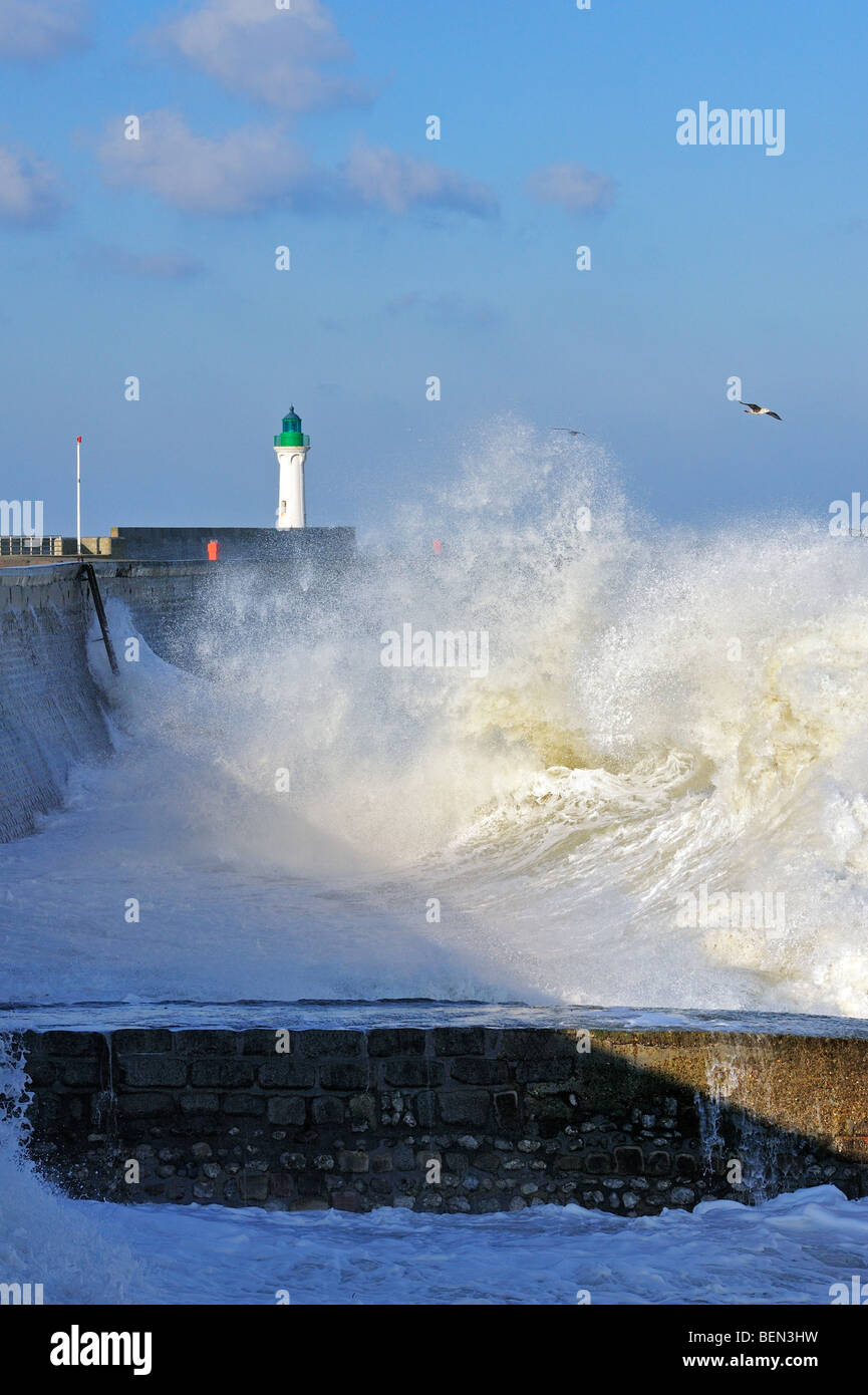 Waves crashing into jetty during storm along the North Sea at Saint-Valéry-en-Caux, Normandy, France Stock Photo