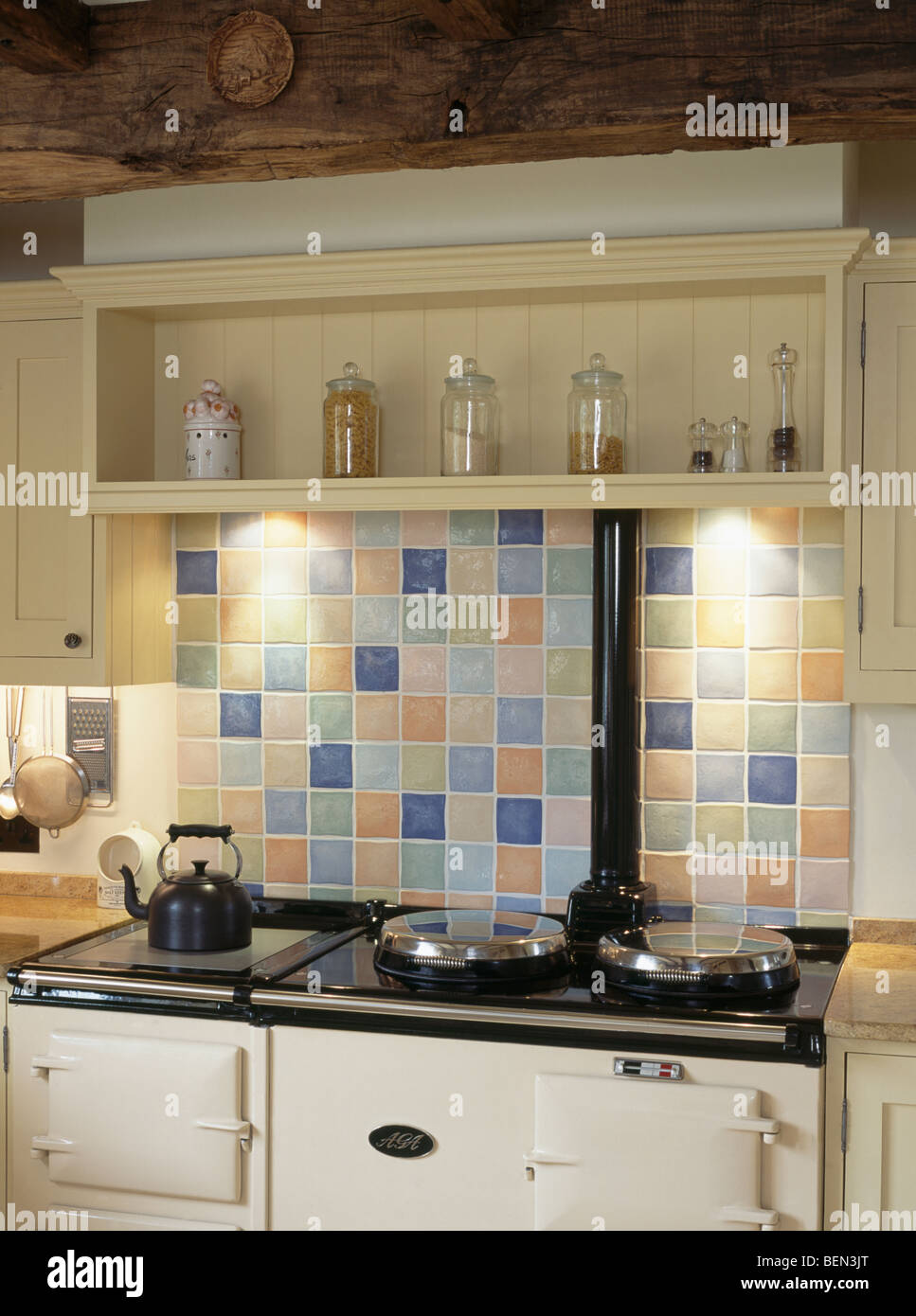 Cream Shelf And Pastel Ceramic Tiled Splash back Above White Aga Oven Cream Shelf And Pastel Ceramic Tiled Splash back Above White Aga Oven