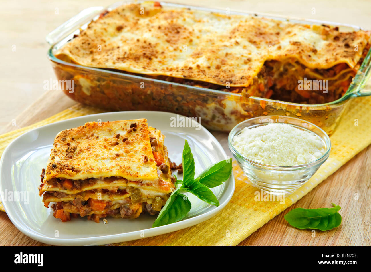 Fresh baked lasagna casserole with a serving cut Stock Photo