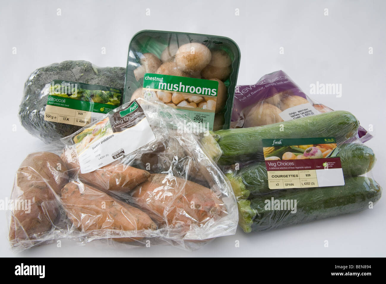 Studio close up Food packaging of five different vegetables both home grown and imported Stock Photo