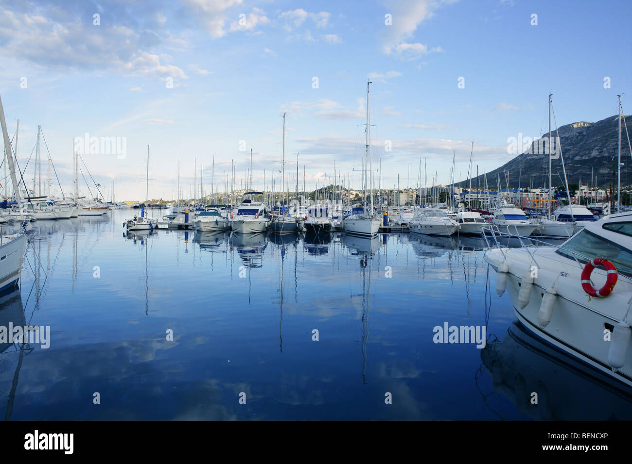 Beautiful blue marina in Mediterranean sea with sky reflection on sea