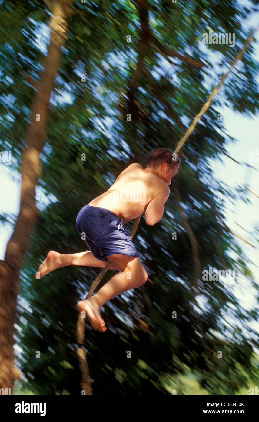 Boy rope swing lake hi-res stock photography and images - Alamy