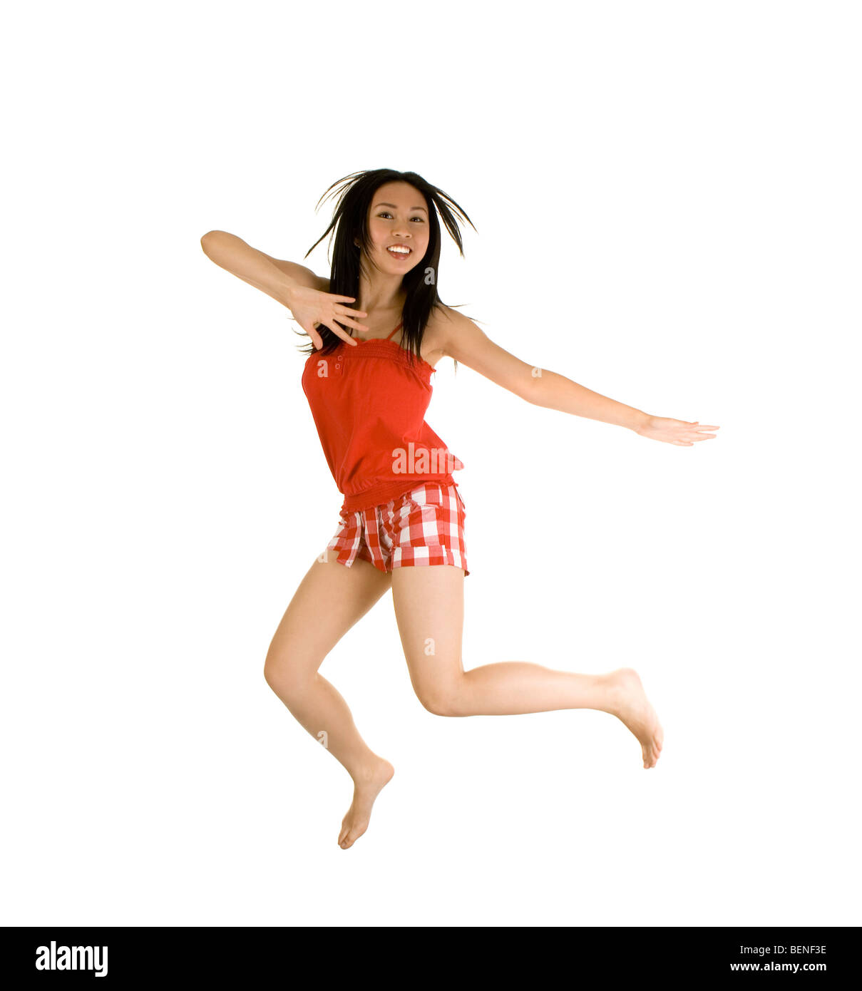 happy asian girl jumping Stock Photo