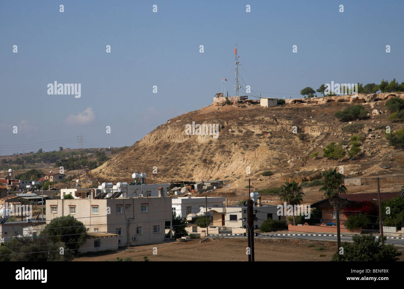 turkish military observation post on the hill above pyla and the UN buffer zone in the green line dividing north south cyprus Stock Photo