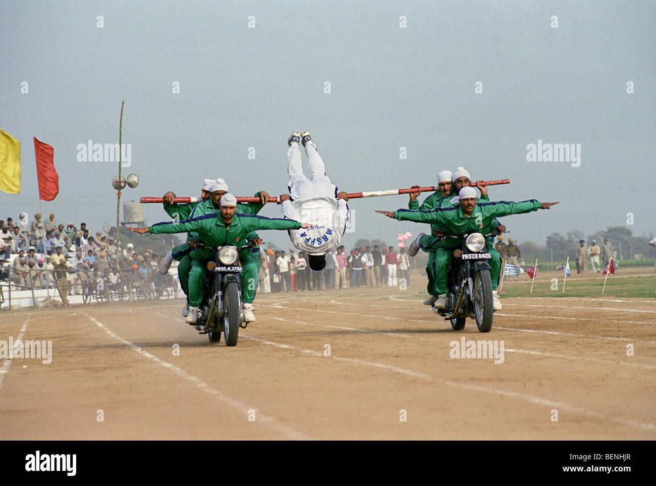 Stuntmen performing at rural Olympic games Kila Raipur Punjab India Stock Photo