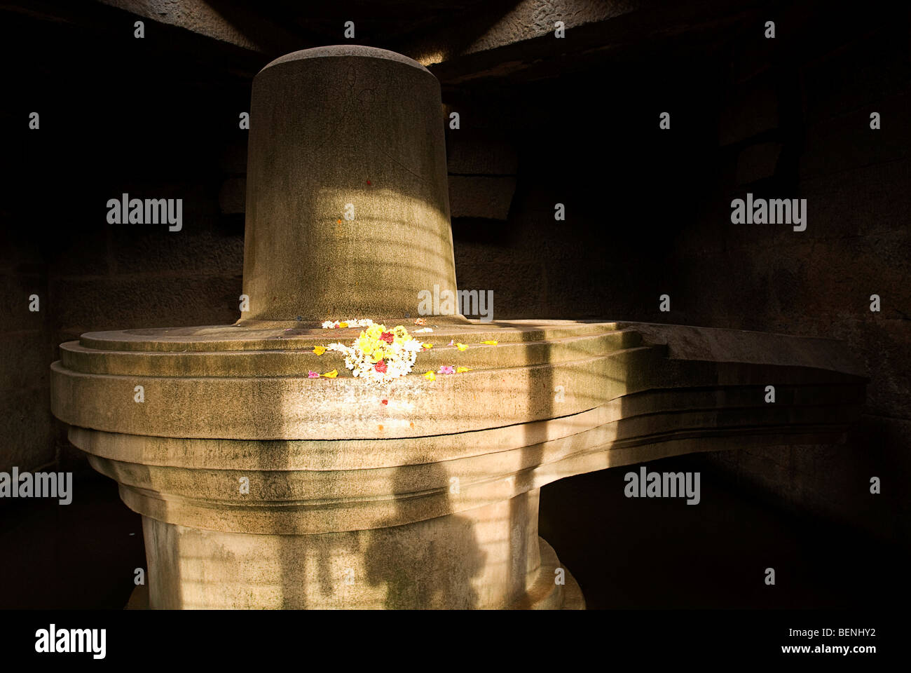 Badavi linga (3 m in height) is the largest monolithic Linga housed inside a chamber with an opening at the front Hampi Stock Photo