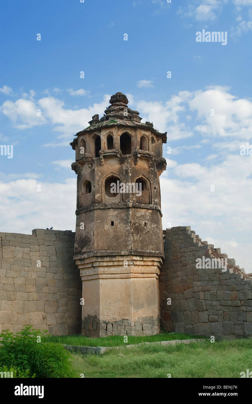 Watch towers built into the enclosure wall on each side to watch approaching threats to the Lotus Mahal Hampi Karnataka India Stock Photo