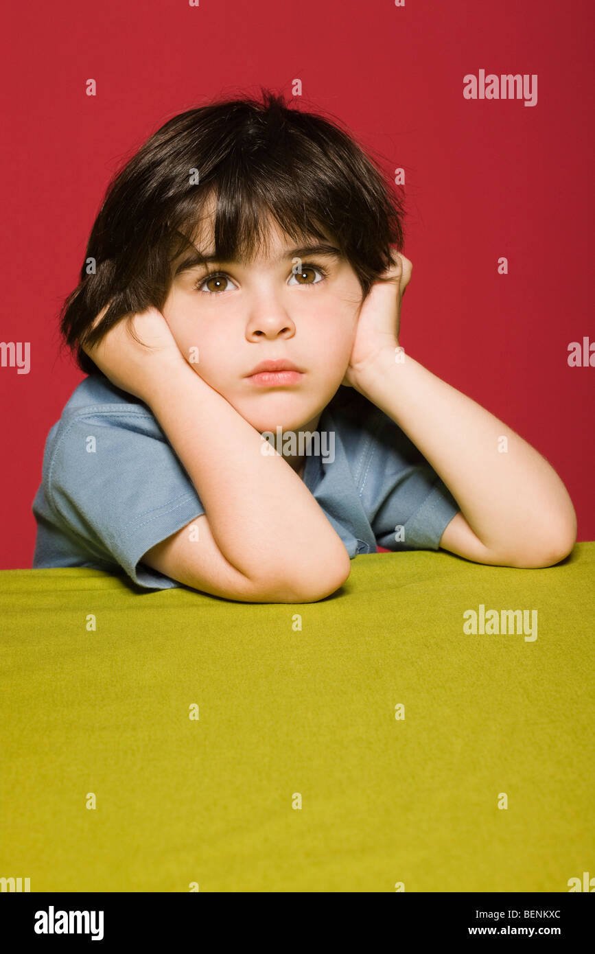 Little boy daydreaming, portrait Stock Photo Alamy