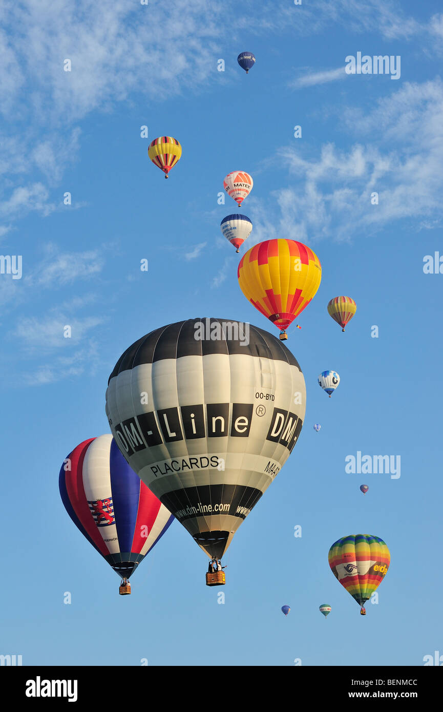 Balloonists / Aeronauts in hot-air balloons during ballooning meeting Stock Photo