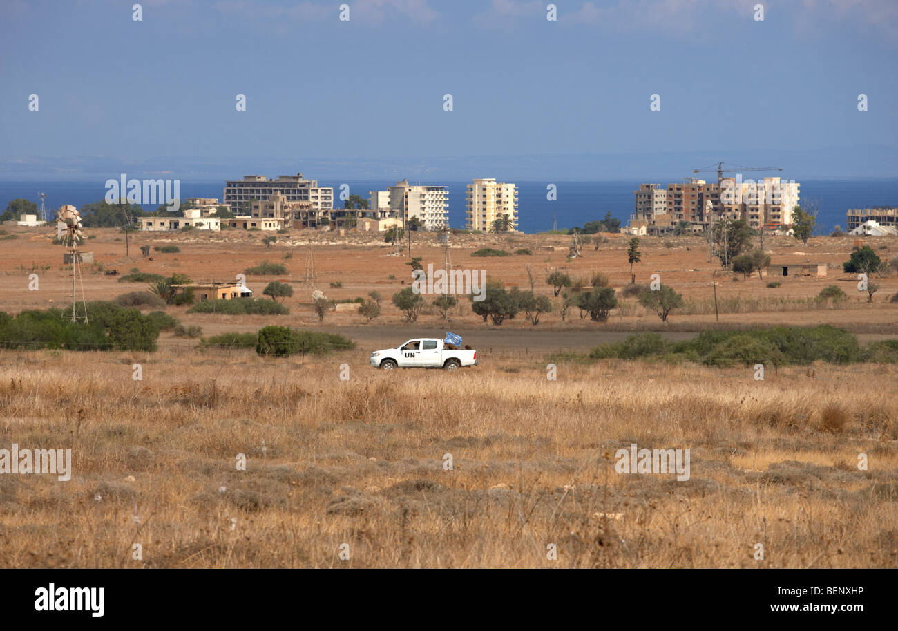 UN border patrol driving through the heat haze in the UN buffer zone in the green line dividing north and south cyprus famagusta Stock Photo