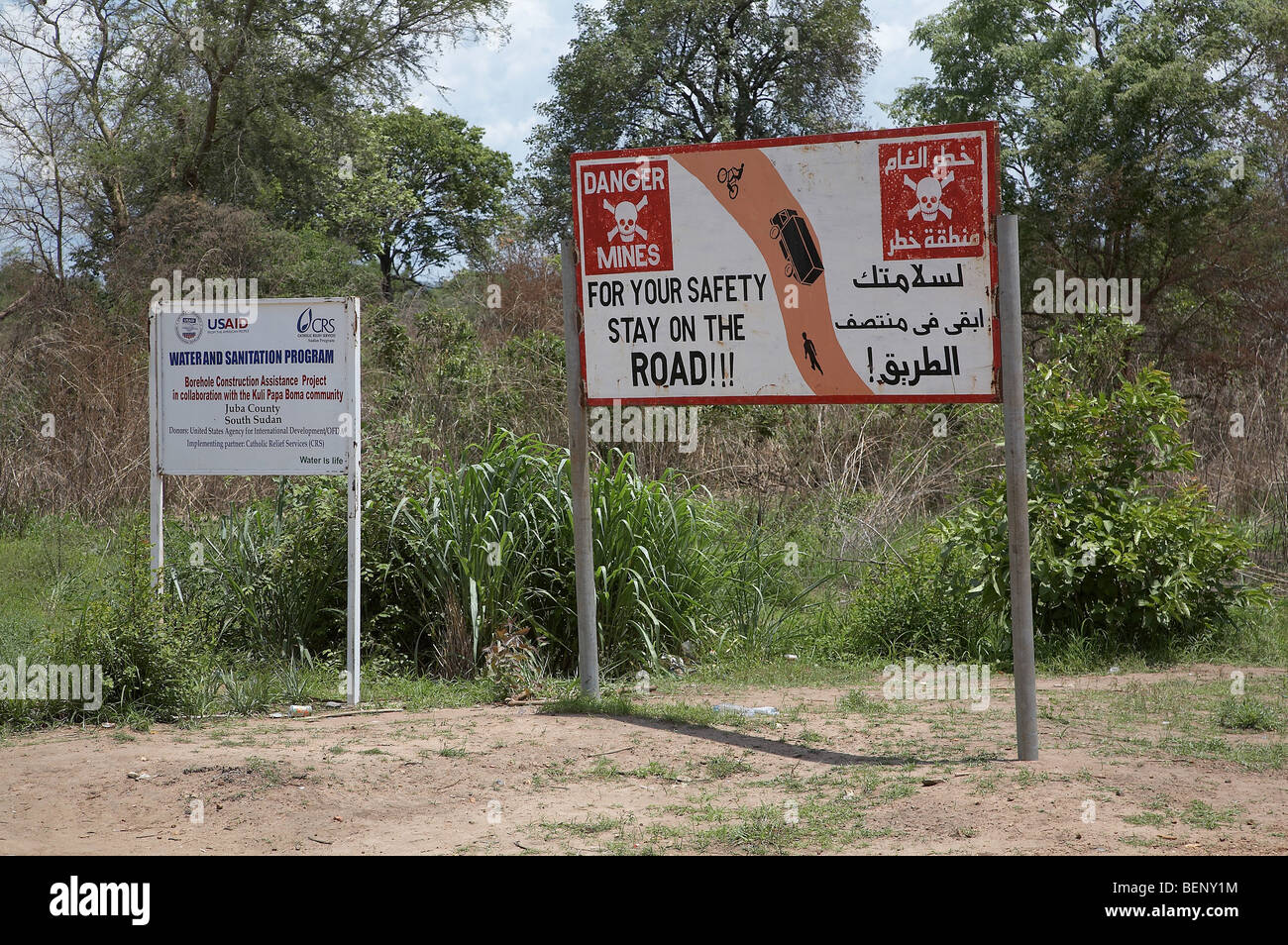 SOUTH SUDAN Sign warning drivers to stay on the road or they might encounter land mines. PHOTO by SEAN SPRAGUE 2008 Stock Photo