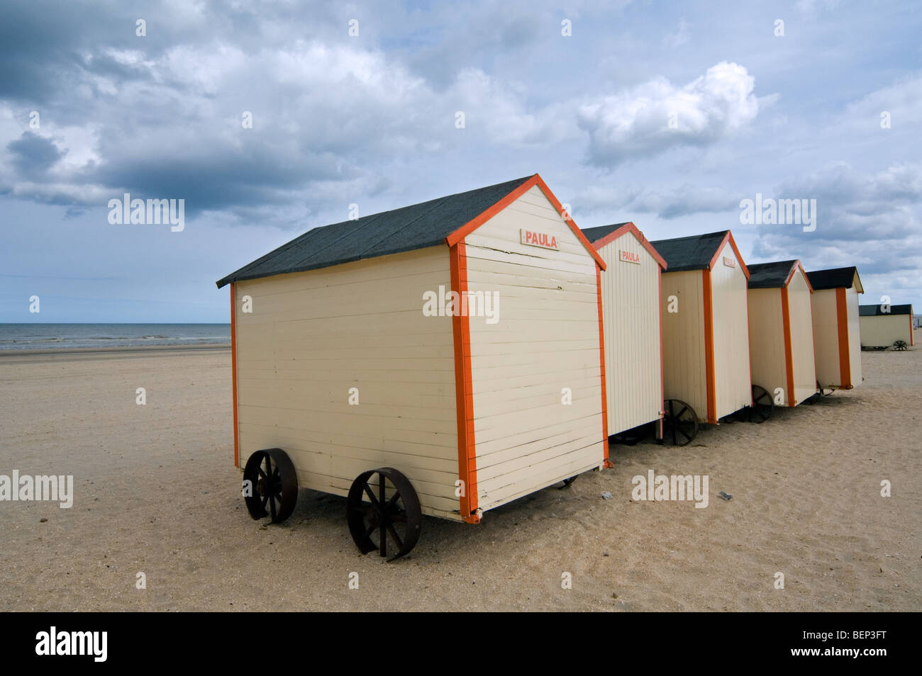 Row Of Colourful Beach Cabins On Wheels Along The North Sea Coast