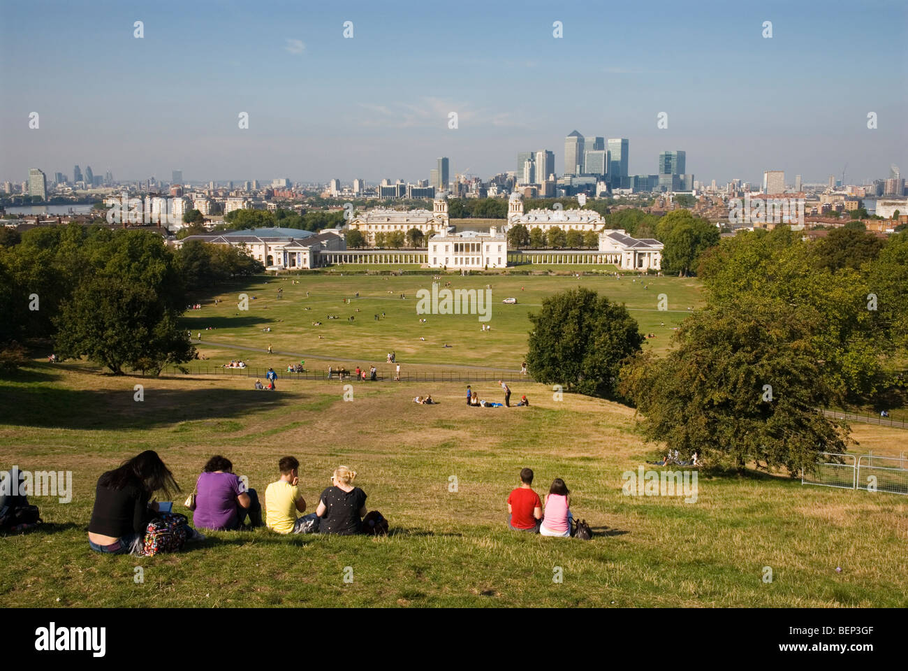 View from Greenwich Park, the National Maritime Museum with the Queens House and the Royal Naval College, Canary Wharf behind Stock Photo