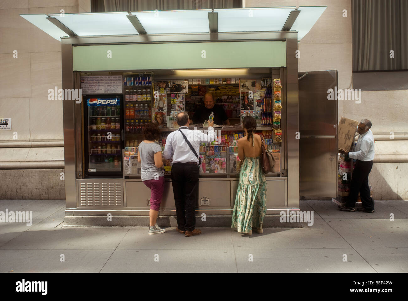 A brand new Cemusa news stand in Wall Street in the Financial District in New York Stock Photo