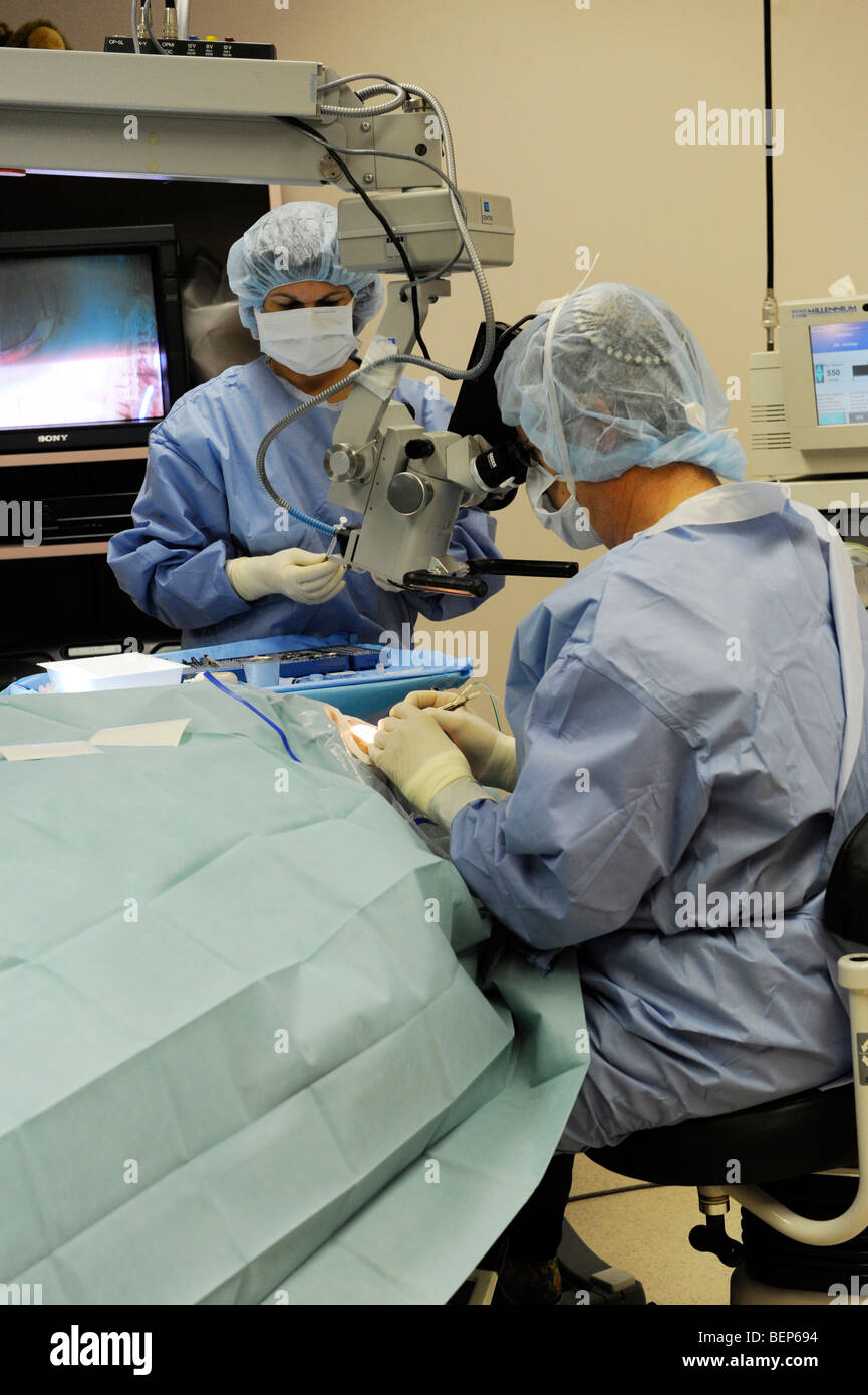 Adult male is prepare and undergoes a crystalens eye implant for cataract removal Stock Photo