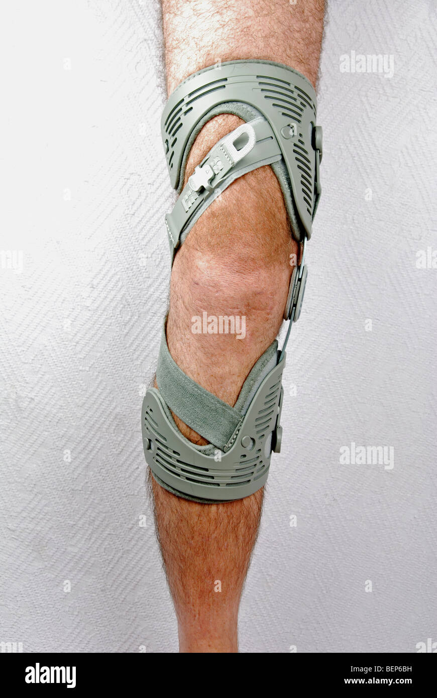 a man wearing a knee brace on his right leg Stock Photo