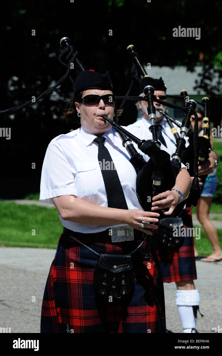 Bagpipers playing in parade Stock Photo Alamy