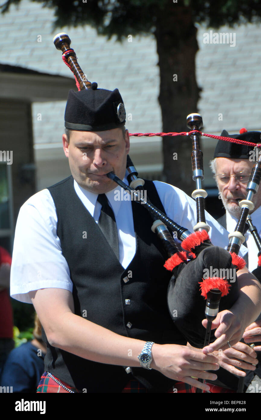 Bagpipers playing in parade Stock Photo Alamy