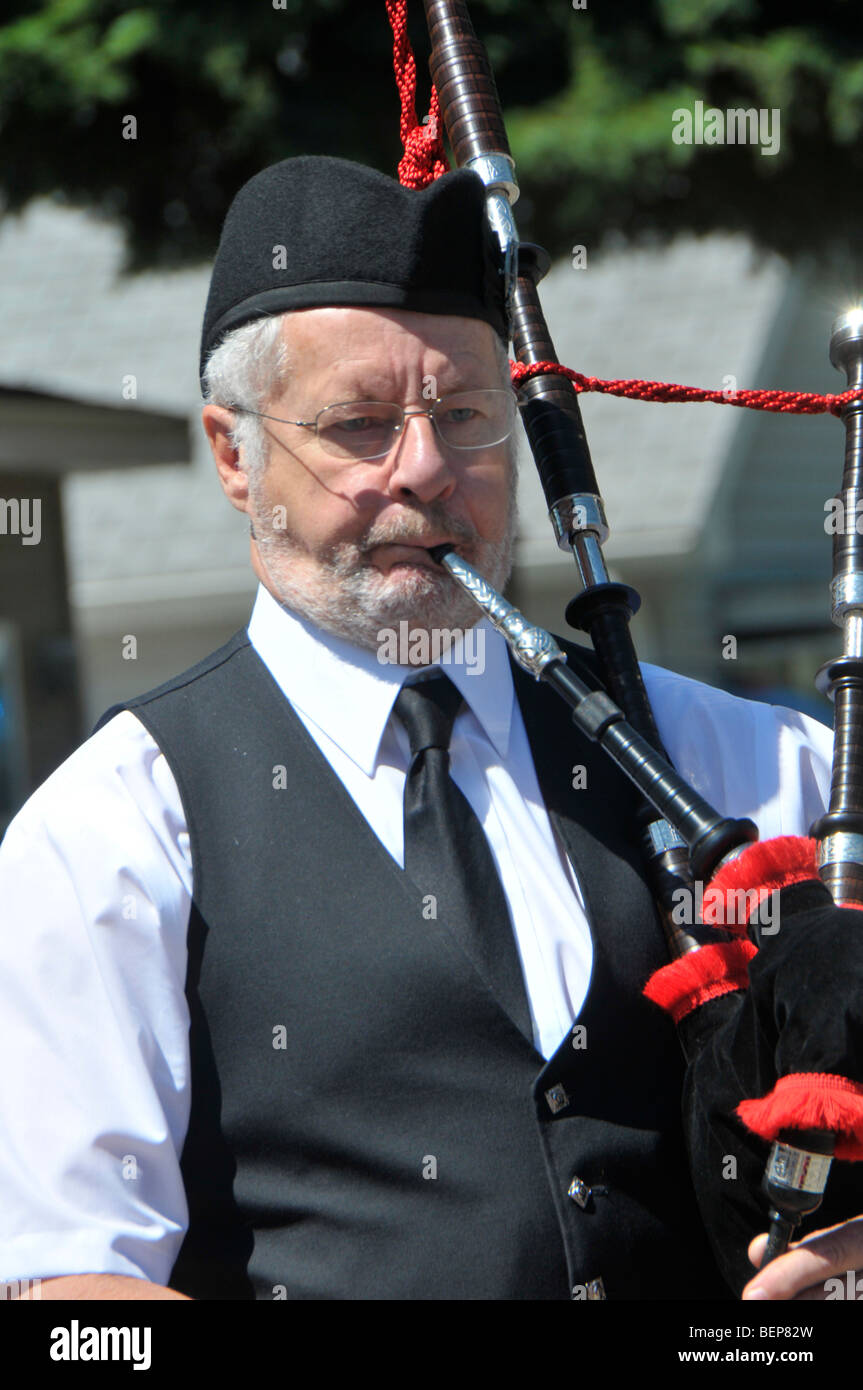 Bagpipers playing in parade Stock Photo Alamy