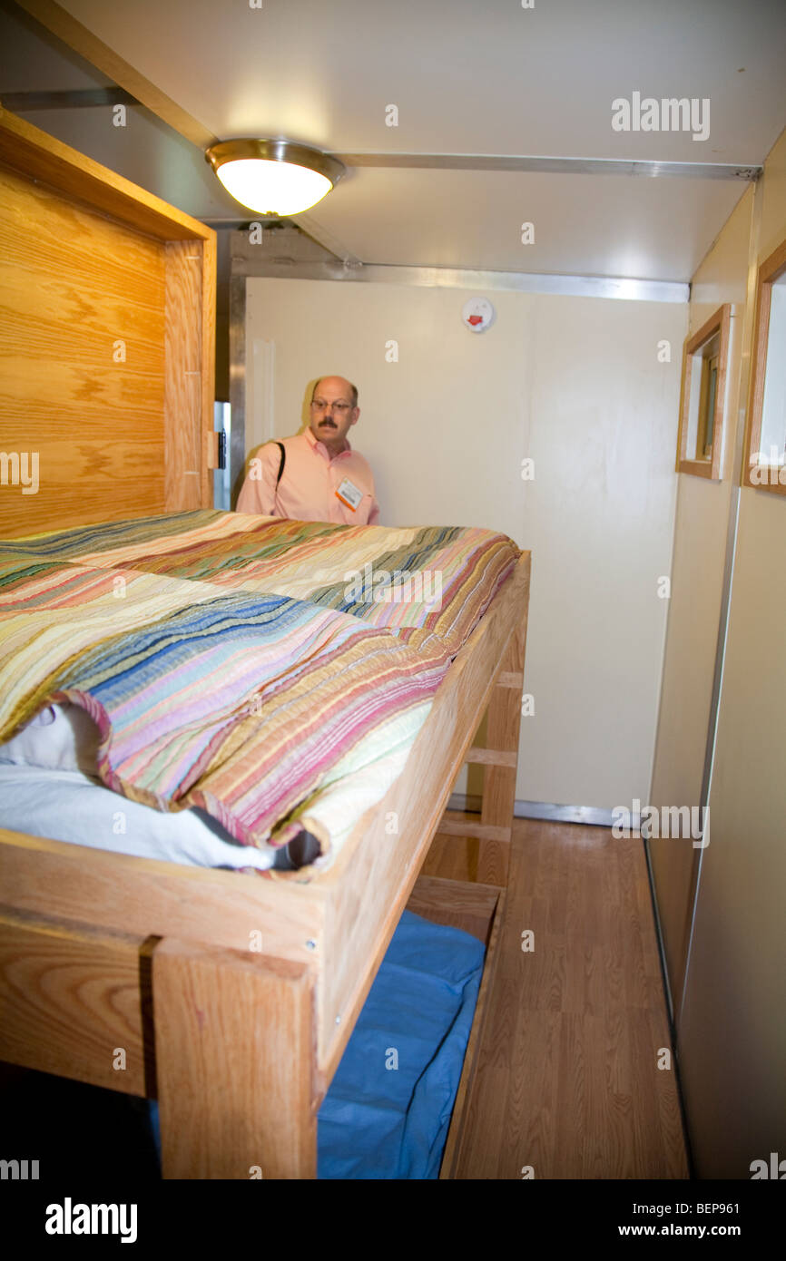 Green Horizon Manufacturing green building portable, on-demand emergency housing on display at exposition. United States Stock Photo