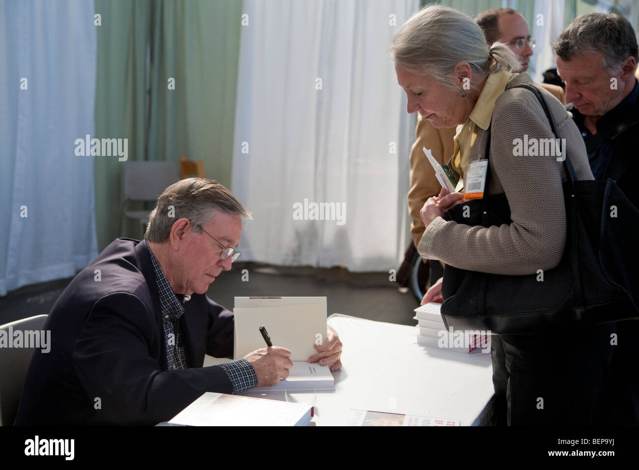 Ray Anderson, Chairman & Founder of Interface, Inc. and author of Confessions of a Radical Industrialist signing books. Stock Photo