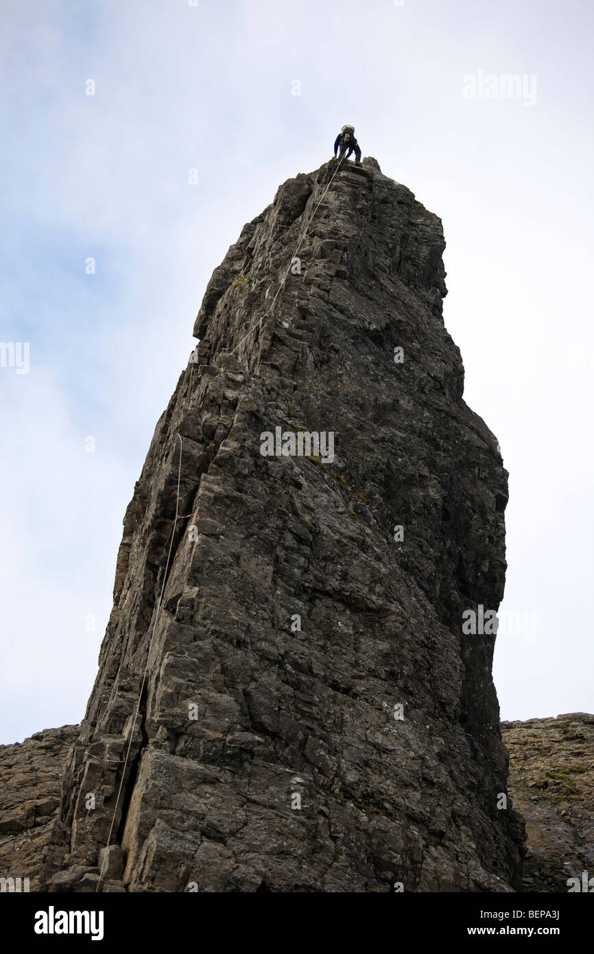 A climber on the Inaccessible Pinnacle, Isle of Skye Stock Photo