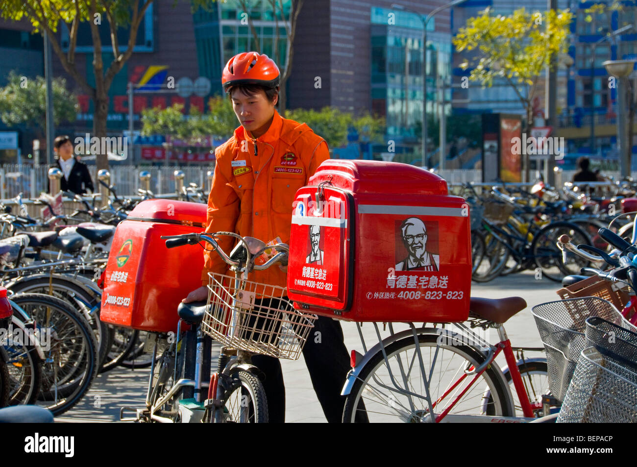 Delivery men on bicycle Beijing China Stock Photo