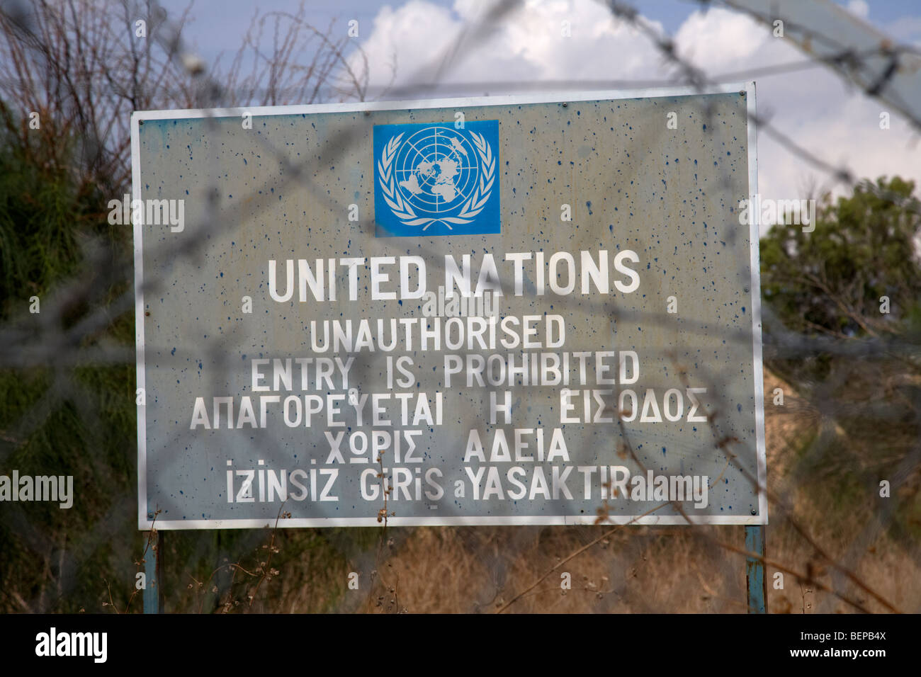 Restricted area of the UN buffer zone in the green line dividing north and south cyprus in nicosia lefkosia united nations prohibited entry sign Stock Photo