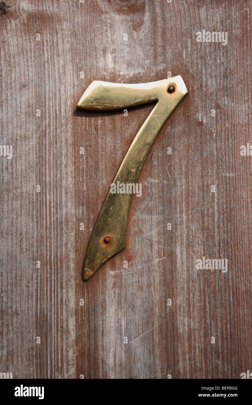 Brass Number 7 (Seven) on Gate at Richmond-upon-Thames, Surrey. Stock Photo