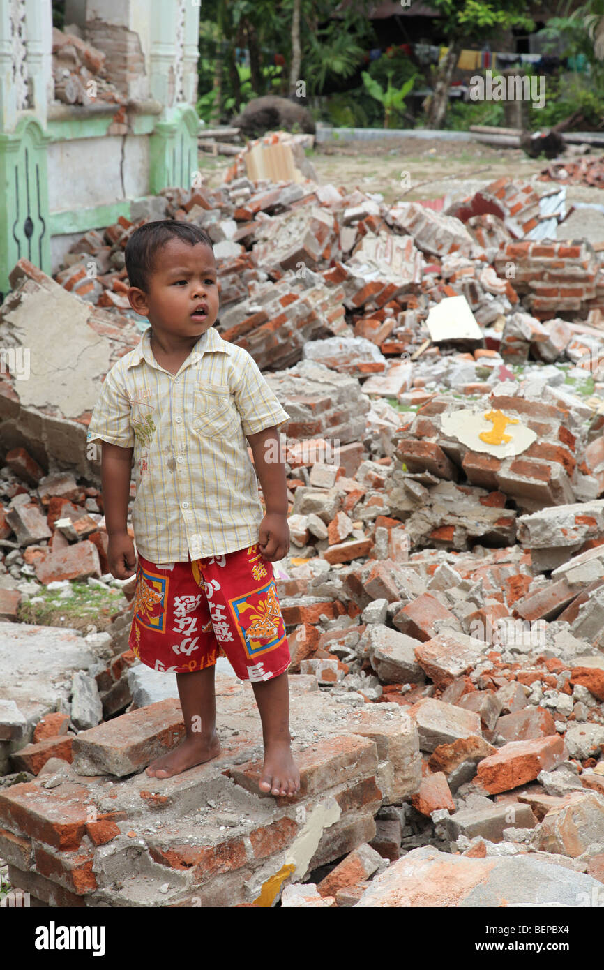 Child in ruins-Kuto Rajo village-West Sumatra-Indonesia Stock Photo