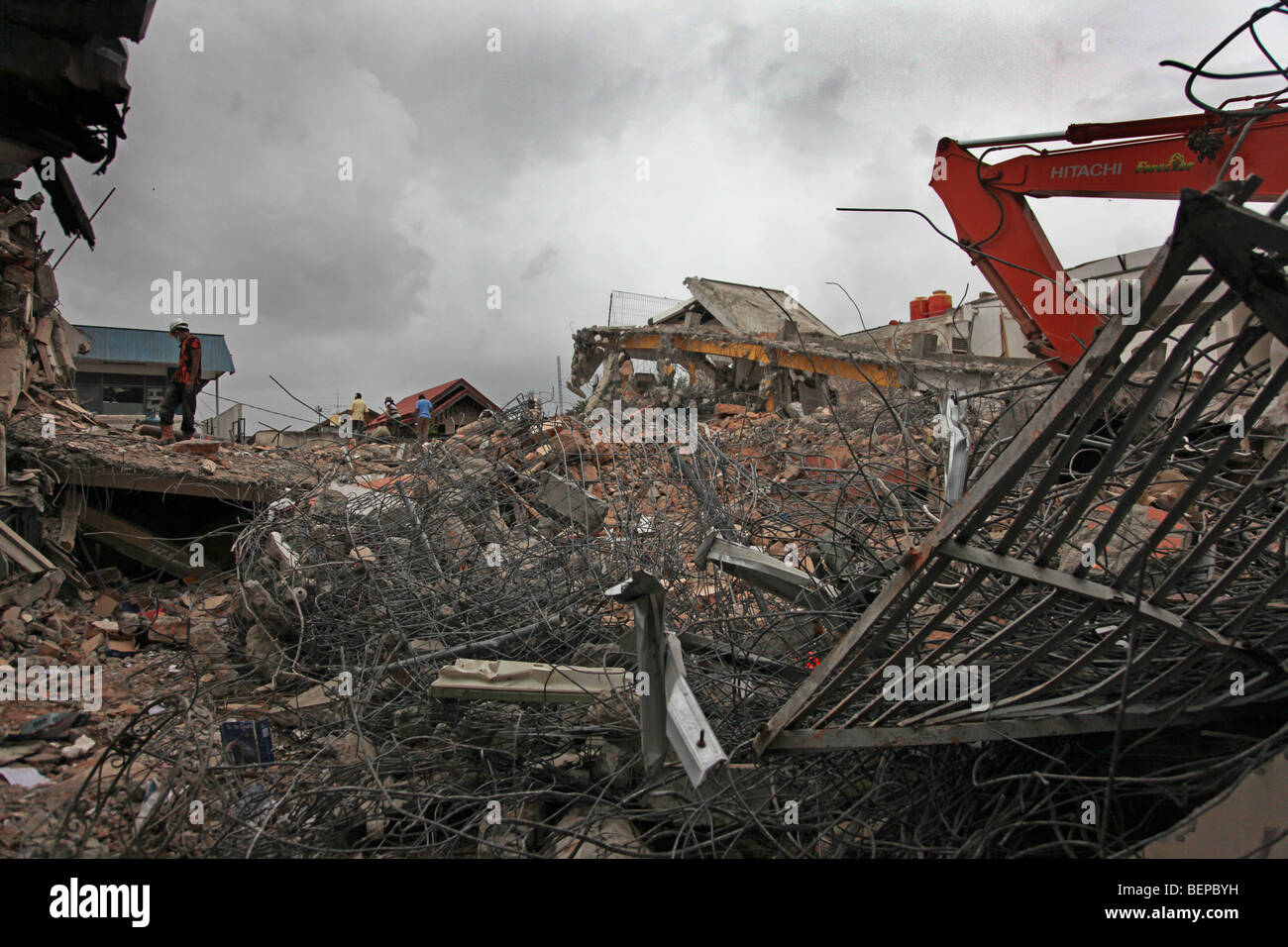 The clear up operation begins on homes devastated by the earthquake of 2nd October, Padang, West Sumatra Stock Photo